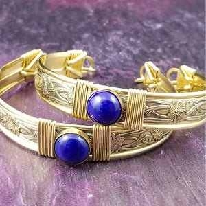 Gold and Lapis. What a luxurious way to show your Ownership / submission. Beautifully feminine and romantic locking handcuffs or anklets. This addition to our SOFT and SWEET Collection is created in precious metals and and all natural gemstones accented with coordinating wire accents. BDSM has never been so luxurious.