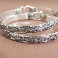 These artisan handcuffs / ankle restraints are hand crafted in a pretty feminine floral pattern that is the epitome of feminine grace. 