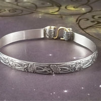 These artisan handcuffs / ankle restraints are hand crafted in a pretty feminine floral pattern that is the epitome of feminine grace. 