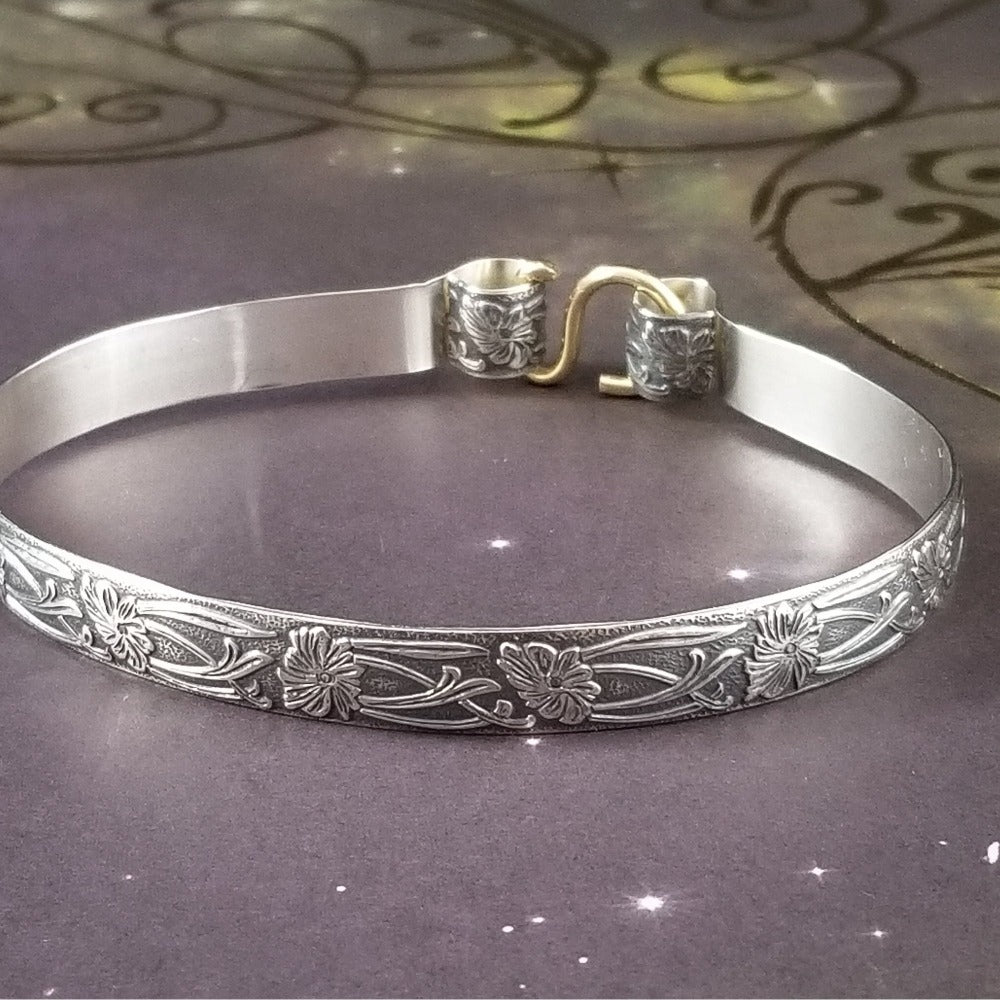 These artisan handcuffs / ankle restraints are hand crafted in a pretty feminine floral pattern that is the epitome of feminine grace. 