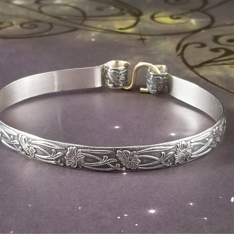 These artisan handcuffs / ankle restraints are hand crafted in a pretty feminine floral pattern that is the epitome of feminine grace. 