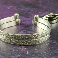 These artisan handcuffs / ankle restraints are hand crafted in a pretty feminine floral pattern that is the epitome of feminine grace. 