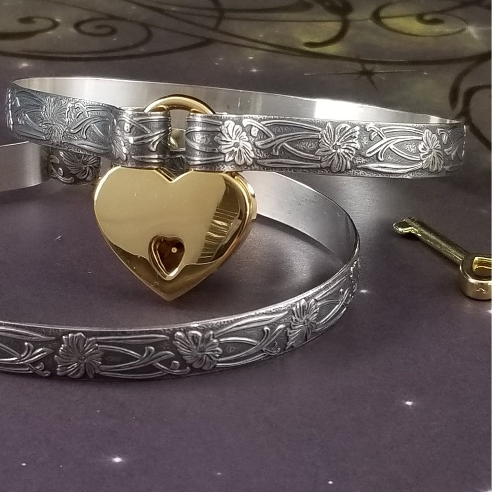 These artisan handcuffs / ankle restraints are hand crafted in a pretty feminine floral pattern that is the epitome of feminine grace. 