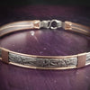 Show your ownership or submission with style and grace. Our best selling ‘SOFT and SWEET’ Locking BDSM submissive collar is now available in Sterling Silver with Rose Gold Accents. This artisan collar is hand crafted in a pretty feminine floral pattern that is the epitome of feminine grace. 