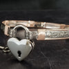 Show your ownership or submission with style and grace. Our best selling ‘SOFT and SWEET’ Locking BDSM submissive collar is now available in Sterling Silver with Rose Gold Accents. This artisan collar is hand crafted in a pretty feminine floral pattern that is the epitome of feminine grace. 