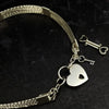 This ASHANTI Slim BDSM Submissive Collar is masterfully crafted from Sterling Silver, offering unparalleled artistry and lasting beauty. Its timeless design makes it the perfect addition to any BDSM enthusiast's collection, ensuring that you can cherish it for years to come.