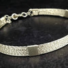 Showcase your power and taste with ASHANTI Slim Collar. This handcrafted collar is artfully crafted with twisted 14K gold filled wire and elevated with gold wraps. A touch of chain in the back ensures a snug fit, so you can move with ease. Wear ASHANTI TWISTED alone or layer it with other chains and pendants--it's the perfect foundation for building endless elegant looks! Plus, the locking collar takes your look up a notch. 