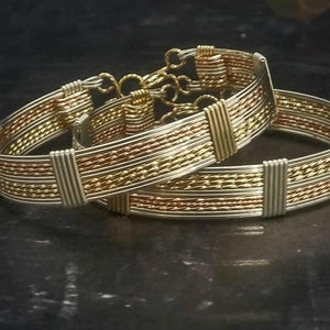 Luxury BDSM Submissive HandCuff Bracelets created with a mix of gleaming precious metals of Sterling Silver, with Hand Twisted Strands of 14K Yellow Gold Filled and Rose Gold Accented with hefty bands of Sterling Silver