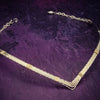 A beautiful symbol of your D/s dynamic, this contemporary V Style Locking BDSM submissive collar is hand crafted in mixed precious metals of sterling silver and gold. As strong and beautiful as the submissive’s heart, this high-quality artisan collar is made to last and will be the foundation of your private collection