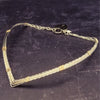 A beautiful symbol of your D/s dynamic, this contemporary V Style Locking BDSM submissive collar is hand crafted in mixed precious metals of sterling silver and gold. As strong and beautiful as the submissive’s heart, this high-quality artisan collar is made to last and will be the foundation of your private collection