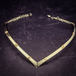 A beautiful symbol of your D/s dynamic, this contemporary V Style Locking BDSM submissive collar is hand crafted in mixed precious metals of sterling silver and gold. As strong and beautiful as the submissive’s heart, this high-quality artisan collar is made to last and will be the foundation of your private collection
