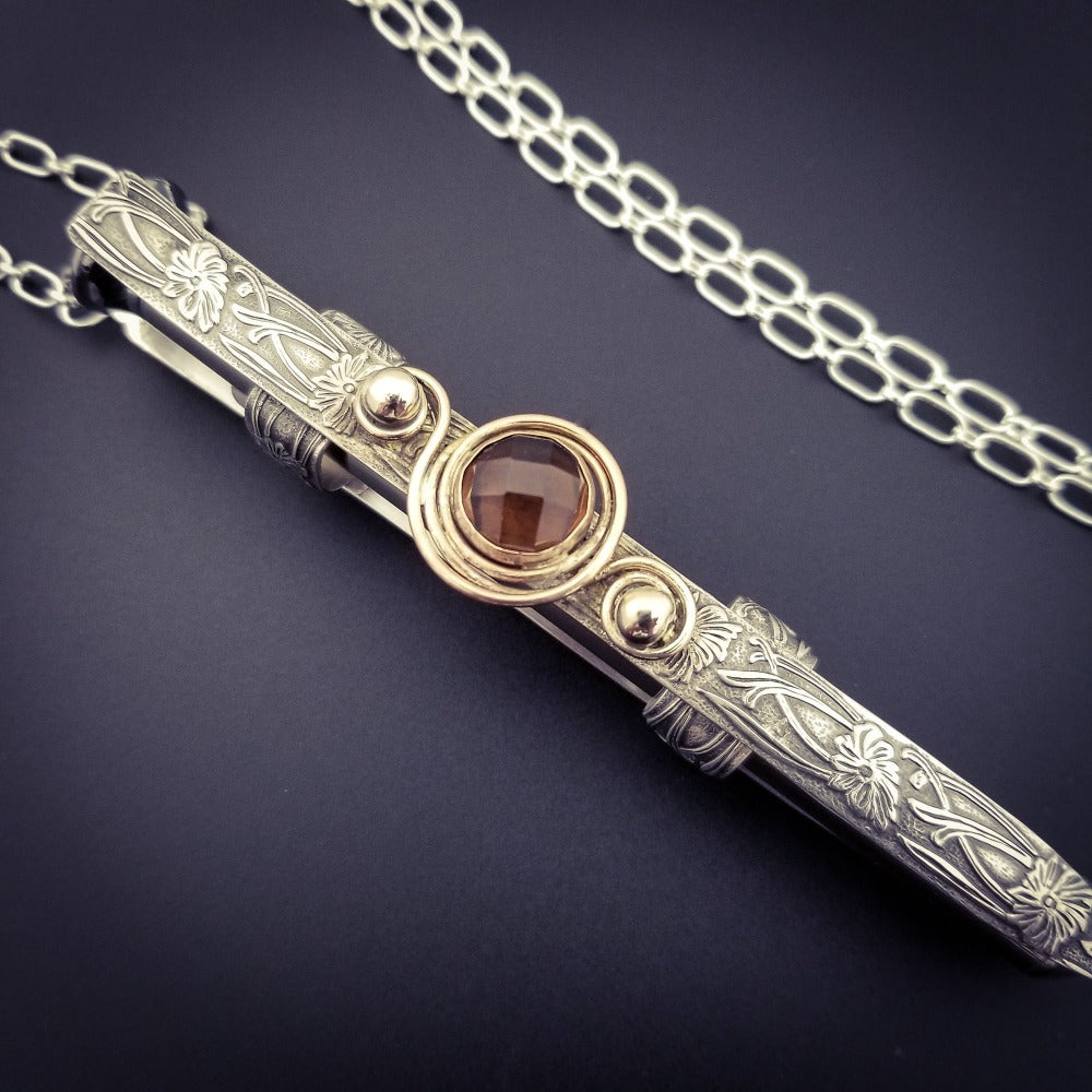 The ultimate luxury, this beauty is unlike any jewelry you've seen! The sterling silver cage holds a sleek and sexy stainless steel vibrator. So discreet, no one will ever guess. Think of all the fun you can have with this wicked little toy! 
