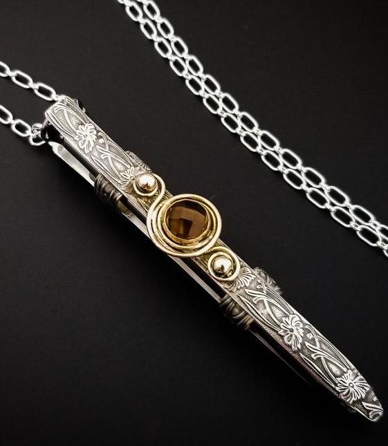 The ultimate luxury, this beauty is unlike any jewelry you've seen! The sterling silver cage holds a sleek and sexy stainless steel vibrator. So discreet, no one will ever guess. Think of all the fun you can have with this wicked little toy! 
