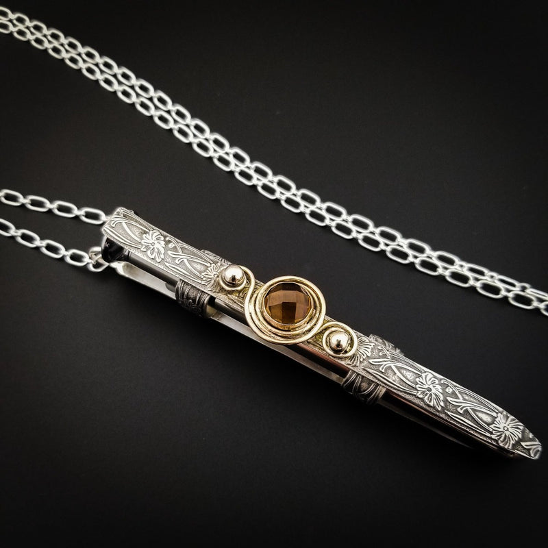 The ultimate luxury, this beauty is unlike any jewelry you've seen! The sterling silver cage holds a sleek and sexy stainless steel vibrator. So discreet, no one will ever guess. Think of all the fun you can have with this wicked little toy! 