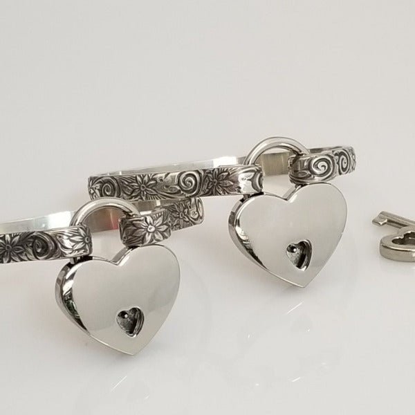 Our ‘WILD FLOWER’ collection speaks of rambling cottage gardens. Sensual and romantic. This artisan BDSM submissive jewelry is handcrafted in a floral pattern of sterling silver. Truly a high-quality artisan collar made to last; it will be a cherished addition to any collection. A beautiful symbol of commitment/ wedding gift for those in a D/s relationship. My Secret Heart Studios