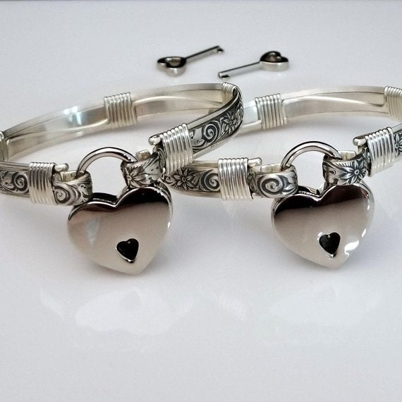 Our ‘WILD FLOWER’ collection speaks of rambling cottage gardens. Sensual and romantic. This artisan BDSM submissive jewelry is handcrafted in a floral pattern of sterling silver. Truly a high-quality artisan collar made to last; it will be a cherished addition to any collection. A beautiful symbol of commitment/ wedding gift for those in a D/s relationship. My Secret Heart Studios