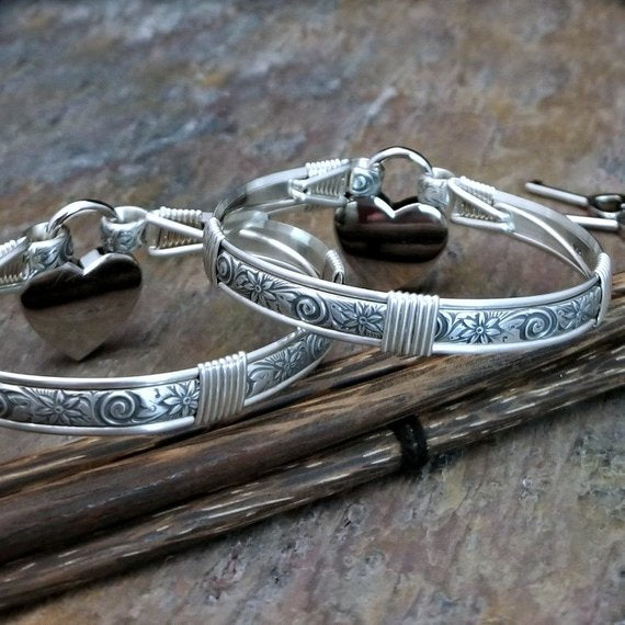 Our ‘WILD FLOWER’ collection speaks of rambling cottage gardens. Sensual and romantic. This artisan BDSM submissive jewelry is handcrafted in a floral pattern of sterling silver. Truly a high-quality artisan collar made to last; it will be a cherished addition to any collection. A beautiful symbol of commitment/ wedding gift for those in a D/s relationship. My Secret Heart Studios