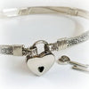 The ‘WILD FLOWER’ BDSM Submissive Collar is hand crafted in Sterling Silver filled floral pattern and wrapped with sterling silver accents. Truly a high-quality artisan collar made to last; it will be a cherished addition to any collection. A beautiful symbol of a D/s relationship.