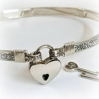 The ‘WILD FLOWER’ BDSM Submissive Collar is hand crafted in Sterling Silver filled floral pattern and wrapped with sterling silver accents. Truly a high-quality artisan collar made to last; it will be a cherished addition to any collection. A beautiful symbol of a D/s relationship.