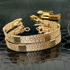 Wire wrapped submissive bracelets that are hand crafted in strands of twisted 14k gold filled and accented with 14k gold filled wraps. 