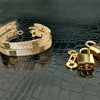 Wire wrapped submissive bracelets that are hand crafted in strands of twisted 14k gold filled and accented with 14k gold filled wraps. 