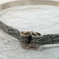 Use this snap-close clasp to turn your Secret Heart submissive collars or cuff bracelets into day wear for the vanilla world. Just slip it through the metal loops and snap closed.