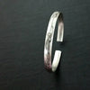 An incredibly beautiful traditional cuff inspired by the art of Alphonse Mucha, with a timeless Art Nouveau floral and vine pattern. This substantial, solid sterling silver cuff is nice and thick, measuring 6.27 mm wide x 2.84 mm thick. The edges are sanded soft, with beveled curves inside, making it oh so comfortable.