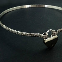 Flaunt your femininity with our sterling LOKELANI artisan submissive collar. Carefully crafted with an exquisite floral pattern and patina-finished for enhanced texture, this BDSM Locking Collar is a timeless piece of quality to be treasured and proudly displayed. Adopt this mythical rose and add to your private collection today!