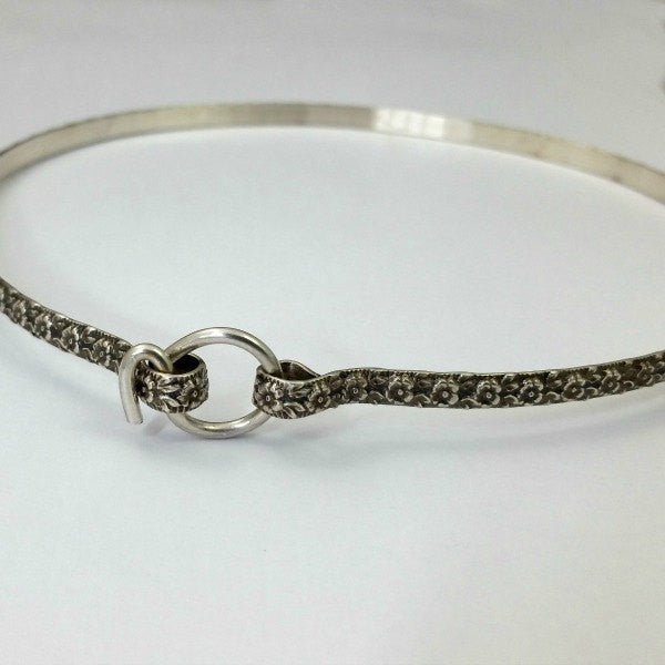 Flaunt your femininity with our sterling LOKELANI artisan submissive collar. Carefully crafted with an exquisite floral pattern and patina-finished for enhanced texture, this BDSM Locking Collar is a timeless piece of quality to be treasured and proudly displayed. Adopt this mythical rose and add to your private collection today!