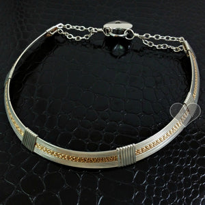 Precious metals embrace to create a seductive collection of artisan wire wrapped jewelry. Big, bold and dramatic, this unisex artisan collar is created with centuries old wire wrapping techniques, using only a few hand tools.
